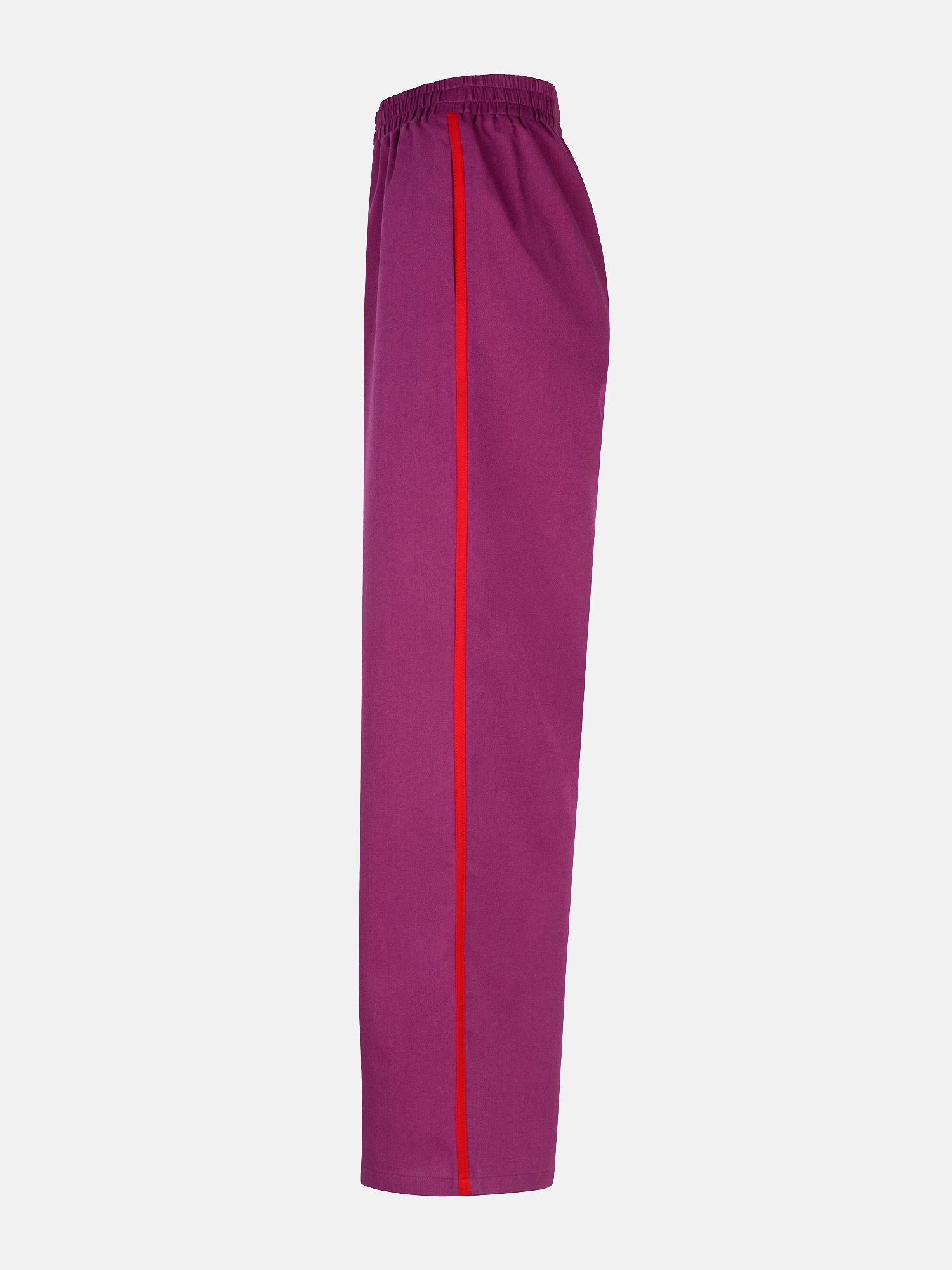Zijkant van de zizi pants van ydence in fuchsia met rode streep.