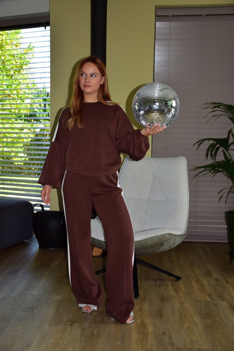 Jo-Ann in een pak van Fluresk