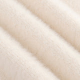 Detailopname van de stof van een gebreide top in ecru | Ydence Mary | Jo&Co Club