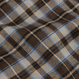 Detailopname van de stof van een rok in bruin-blauwe ruit | Ydence Jessica | Jo&Co Club