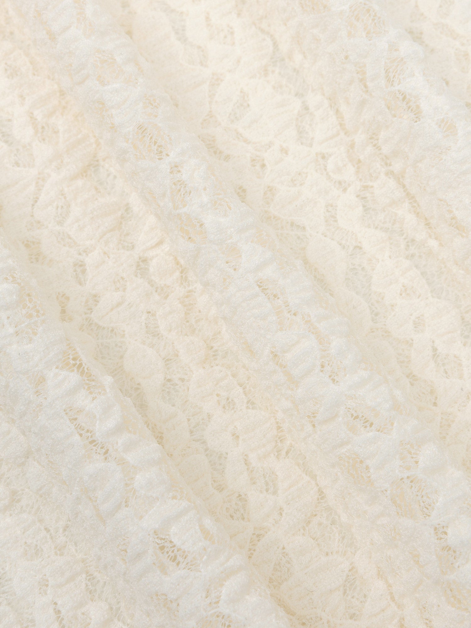 Detailopname van de stof van een top in ecru | Ydence Roberta | Jo&Co Club