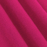 Close-up van de ribgebreide fuchsia stof van de Ydence Lenny topzacht, stretchy en comfortabel.