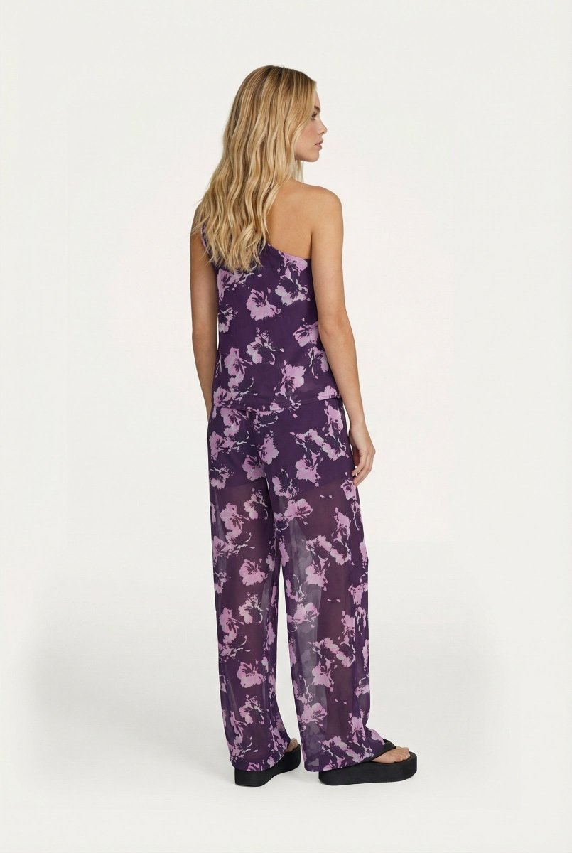 Paarse jumpsuit met bloemenprint, one-shoulder design en wijde pijpen | Jo&Co Club