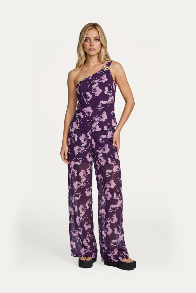 Jumpsuit paars – Paarse one-shoulder set met roze bloemenprint en wijde pijpen | Jo&Co Club