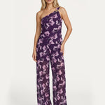 Jumpsuit paars – Paarse one-shoulder set met roze bloemenprint en wijde pijpen | Jo&Co Club