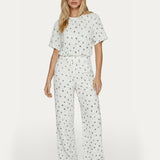 Tweedelige set wit met strikjesprint – comfortabele co-ord met wijde broek | Jo&Co Club