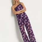 Jumpsuit paars – Eenschouder design met bloemenprint en wijde pijpen | Jo&Co Club