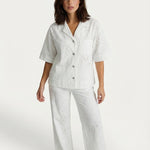 Witte broderie anglaise set – blouse met korte mouw en wijde broek | Jo&Co Club