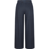 Donkerblauwe wijde broek met bruine stippenprint, vooraanzicht | Fluresk Lydia pants | Jo&Co Club