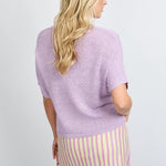 Top Fluresk Niala Orchid Purple – achterkant van de lila gebreide top op model | Jo&Co Club