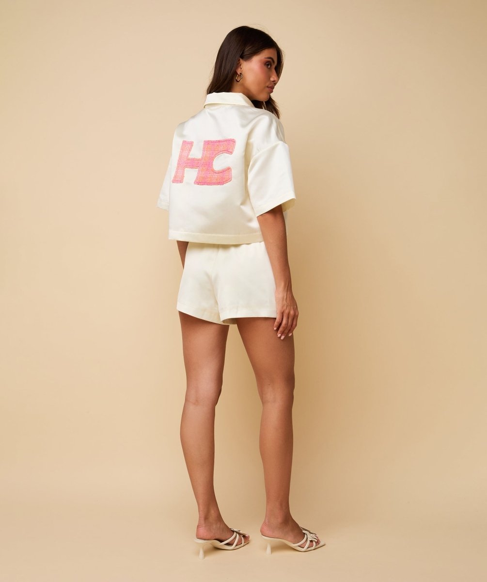 Jas HEYB Club Bowy Jacket crème – met roze 'HC' letters op de rug | Jo&Co Club