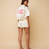 Jas HEYB Club Bowy Jacket crème – met roze 'HC' letters op de rug | Jo&Co Club