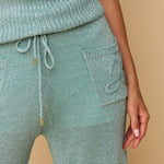 Broek HEYB Club Charly Trousers Azure Blue – gebreid met metallic glans en opgestikte zakken | Jo&Co Club