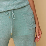Broek HEYB Club Charly Trousers Azure Blue – gebreid met metallic glans en opgestikte zakken | Jo&Co Club
