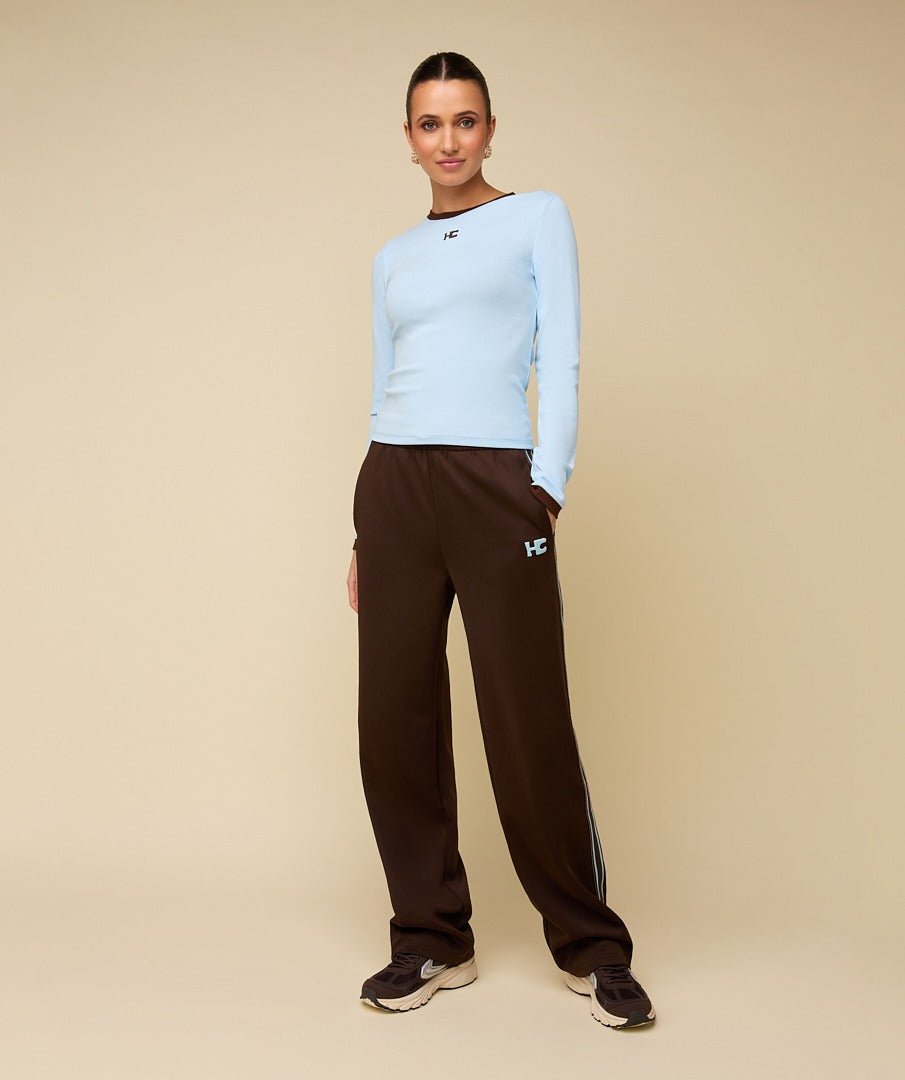 Achterkant of detail lichtblauwe longsleeve met bruine randjes HEYB Club | Jo&Co Club
