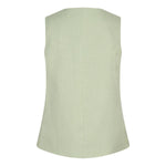 Een productfoto van een mouwloos gilet in een lichte, pistachegroene kleur, gepresenteerd | Lofty Manner Shirin | Jo&Co Club