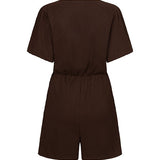 Een donkerbruine playsuit, vrijstaand gefotografeerd tegen een witte achtergrond | Lofty Manner Maddie | Jo&Co Club