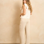 Broek Lofty Manner Trouser Rio beige – beige broek met wijde pijpen en crinkle-textuur | Jo&Co Club