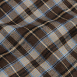Detailopname van de stof van een blouse in bruin-blauwe ruit | Ydence Tamila | Jo&Co Club