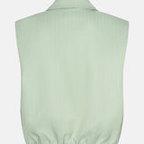 Achterkant van een mouwloos gilet in een lichte saliegroene kleur | Ydence Jeanie | Jo&Co Club