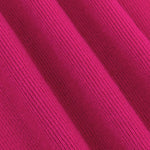 Close-up van de ribgebreide fuchsia stof van de Ydence Lenny topzacht, stretchy en comfortabel.