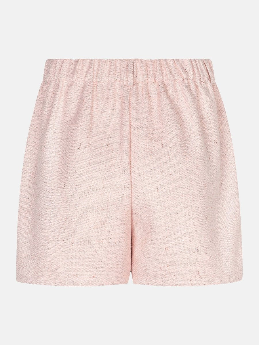 Een vrijstaande productfoto van een lichtroze short op een effen, lichtgrijze achtergrond | Ydence Harley | Jo&Co Club