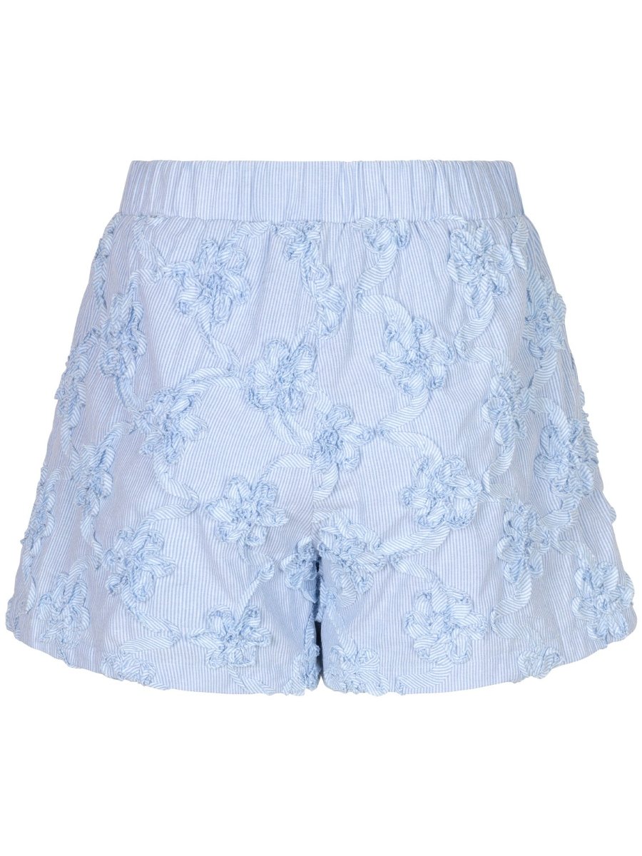 Een vrijstaande productfoto van een korte broek tegen een witte achtergrond | Ydence Rosa | Jo&Co Club
