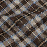 Detailopname van de stof van een rok in bruin-blauwe ruit | Ydence Jessica | Jo&Co Club