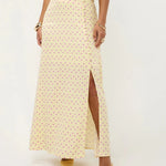 Lange, lichtgele rok met een paarse polkadotprint | Ydence Louis | Jo&Co Club