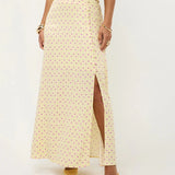 Lange, lichtgele rok met een paarse polkadotprint | Ydence Louis | Jo&Co Club