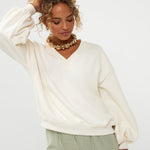 Ydence Sweater Strawberry | Ecru in gebroken wit (ecru); de broek heeft een, wijde pijpen