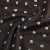 Detailopname van de stof van een top in bruin | Ydence Bailey | Jo&Co Club