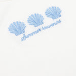 Dit is een detailopname van een gebroken witte, geribde top | Ydence Sea shells | Jo&Co Club