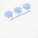 Dit is een detailopname van een gebroken witte, geribde top | Ydence Sea shells | Jo&Co Club